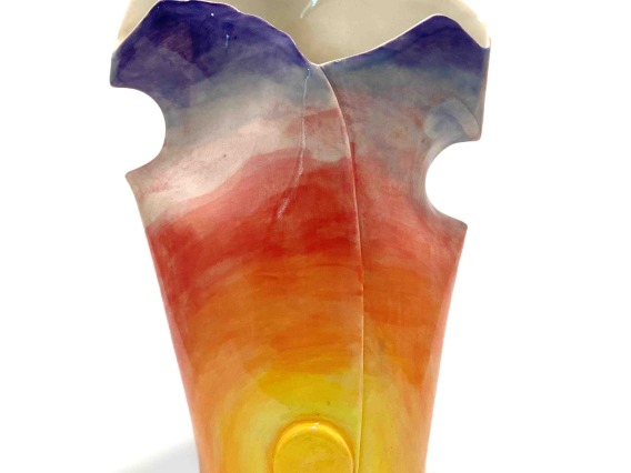 blue and yellow vase sculpture