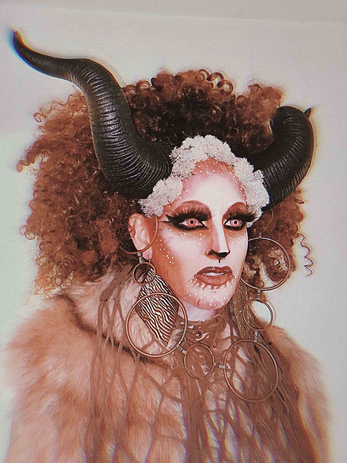 woman with horns drawing